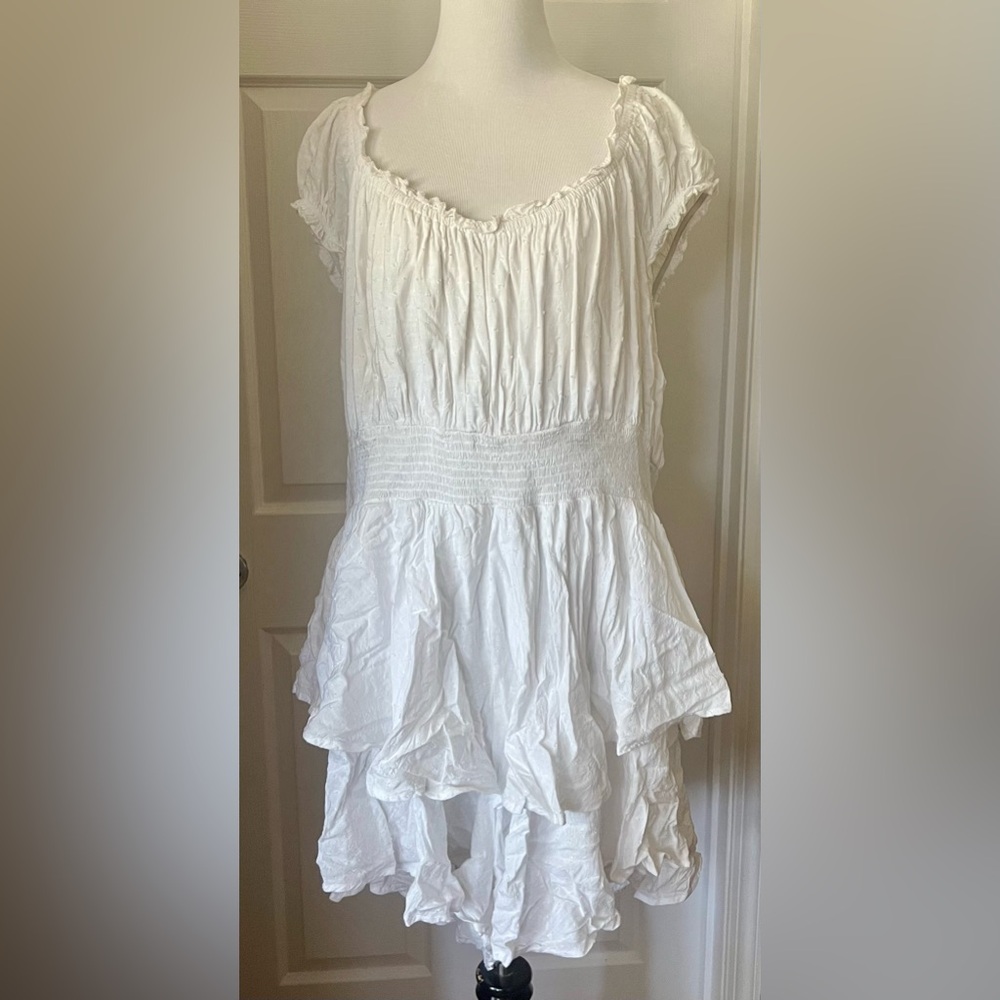Romantic light white ruffled romper